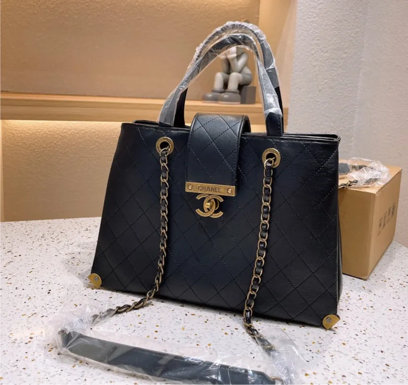 Black leather Chanel woman handbag