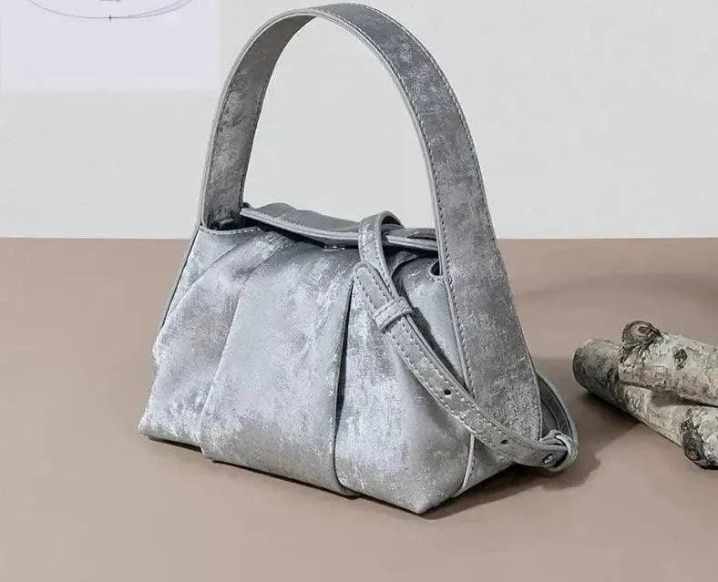 Sustainable Elegance Satin Cowhide Dumpling Handbag